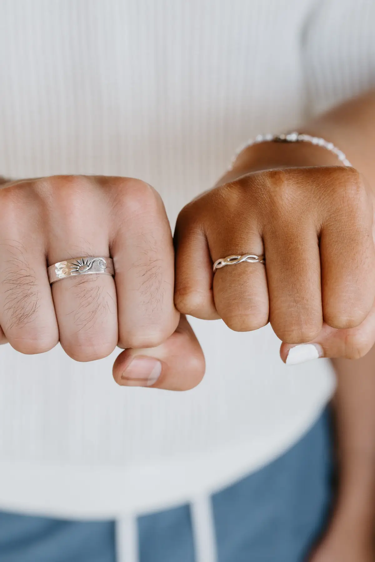 Two matching silver bands made in a couple class