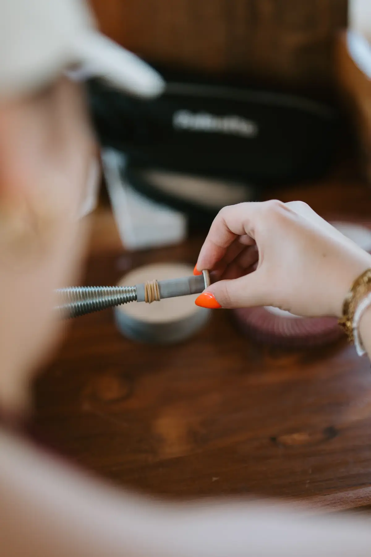 Filing a silver piece at the bench